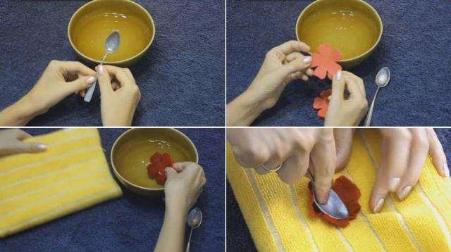 باستخدام القوالب ، نقطع بتلات زهورنا الاصطناعية. لوردة واحدة ، ستحتاج إلى أربع أزهار - فراغات سيتم قطعها وفقًا للقالب