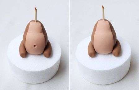 Fastgør stykket til torsoen og tegn folder på maven.