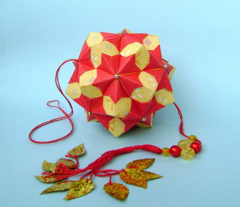 أمثلة صور Kusudama: ما هو - كيفية صنع كرة معيارية سحرية من الورق بيديك ، مخططات لتجميع زهور الأوريغامي
