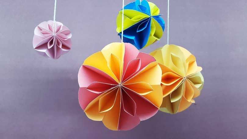 أمثلة صور Kusudama: ما هو - كيفية صنع كرة معيارية سحرية من الورق بيديك ، مخططات لتجميع زهور الأوريغامي
