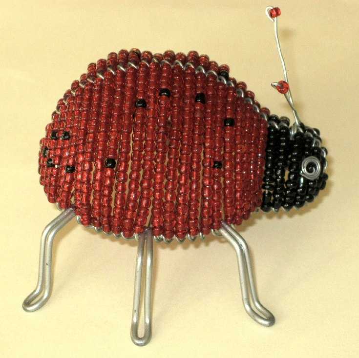 الحرف اليدوية من الخرز ذات المخططات: أمثلة للصور ومقاطع الفيديو - تعليمات ، وصف لصنع الحرف اليدوية من الخرز