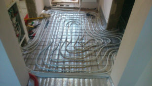 Lämpimän veden lattian etanan asettamisjärjestelmä