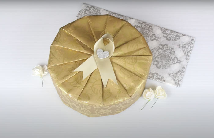 Kuvassa näkyy - Kuinka pakata lahja, kuva. Purkin pakkaus